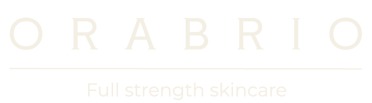 Logo for Orabrio with word Orabrio, a line beneath and text under the line saying Full Strength Skincare. The logo is in hay white on a transparent background.